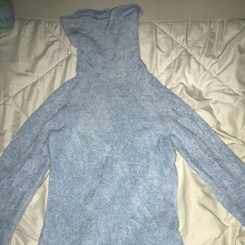 A blue sweater